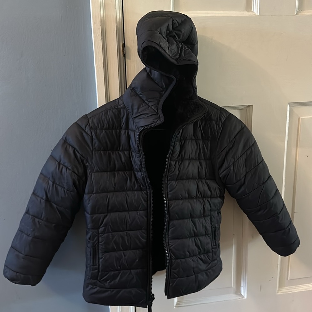 Kids reversible insulated fleece jacket. Water & wind resistant, full zip front